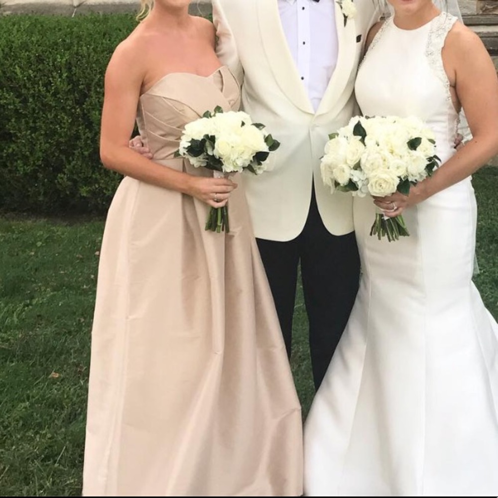 Champagne strapless bridesmaid’s dress